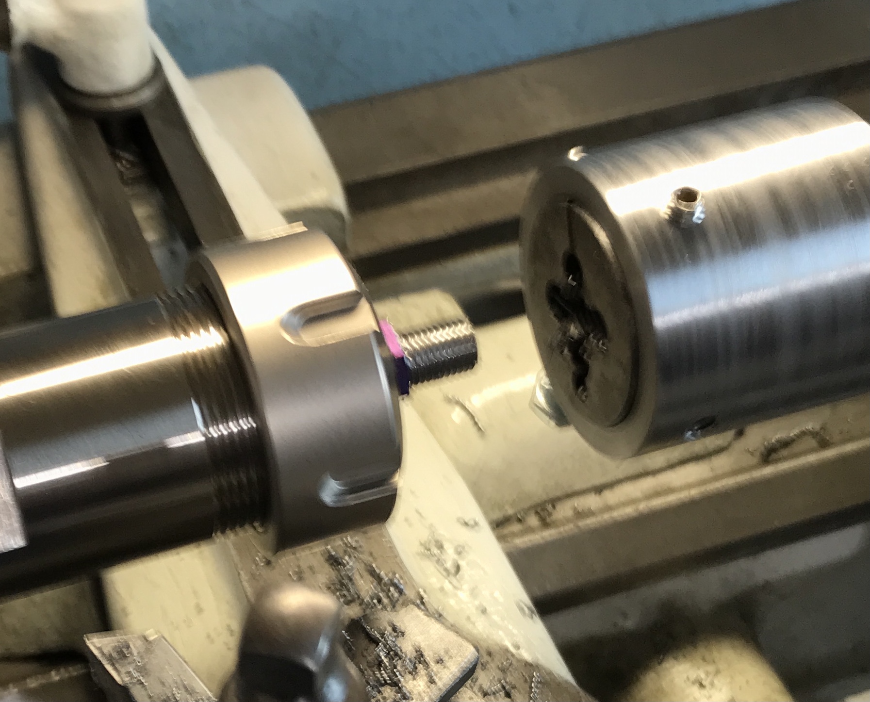 The die holder after cutting threads